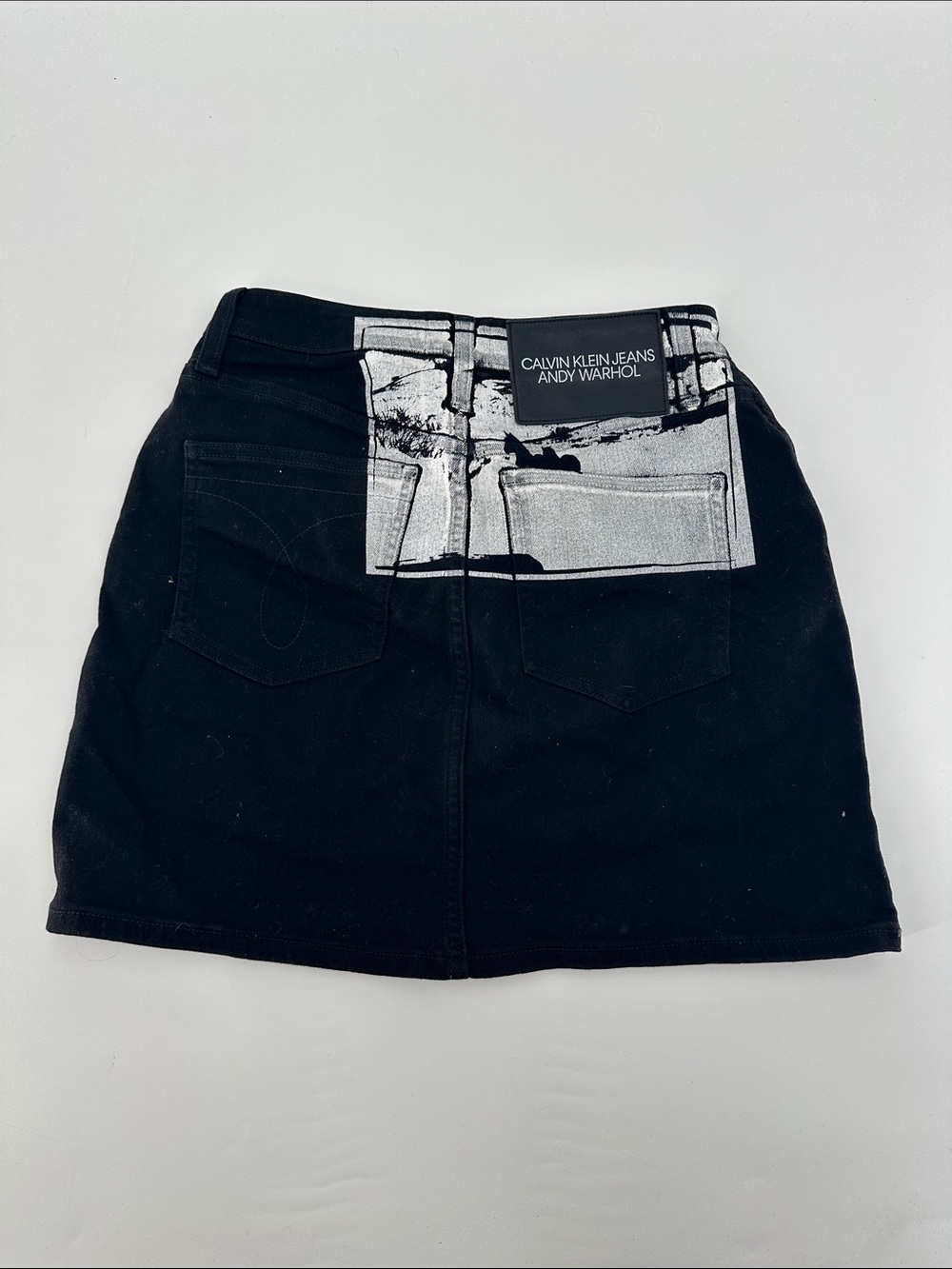 Calvin Klein Jeans Black Mini Skirt with Graphic Back Print